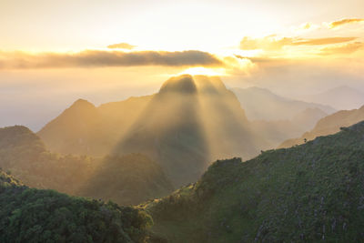 Scenic view of mountains against sky during sunset