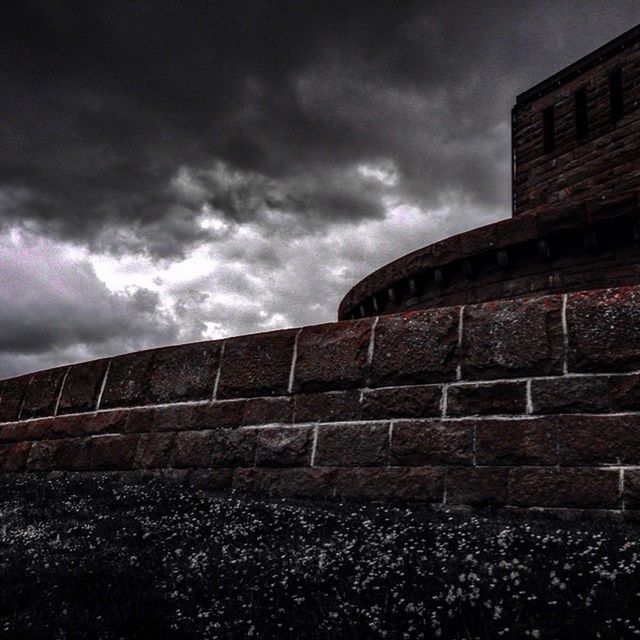 architecture, built structure, sky, building exterior, cloud - sky, cloudy, low angle view, cloud, overcast, old, weather, building, brick wall, abandoned, outdoors, day, no people, house, stone wall, wall - building feature