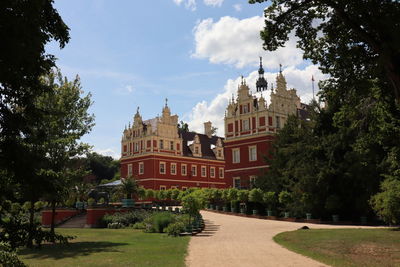 View of historical building in city against sky