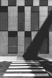 Shadow of building on footpath