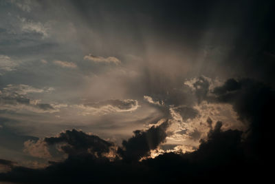 Low angle view of dramatic sky during sunset