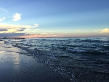 Scenic view of sea against sky during sunset