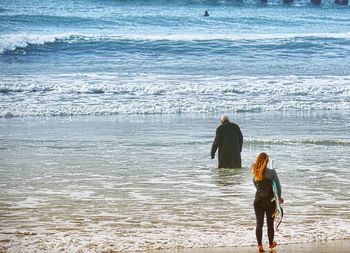 Woman standing on beach