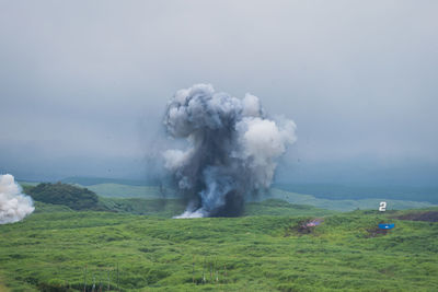 Scenic view of land against sky