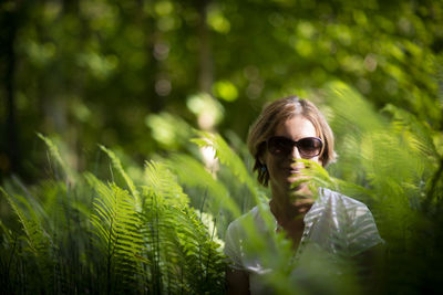 Portrait of young woman in sunglasses