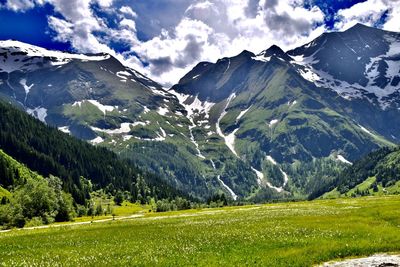 Scenic view of snowcapped mountains against sky