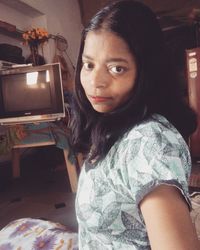 Portrait of beautiful woman at home