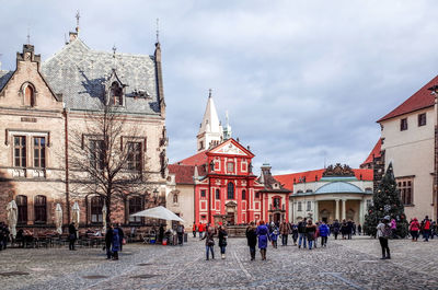 Tourists at st georges basilica at prague castle in czech republic