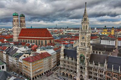 Munich cathedral at marienplatz against cloudy sky