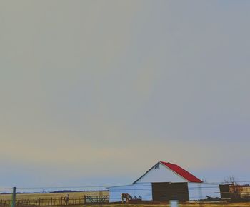 Lifeguard hut against clear sky