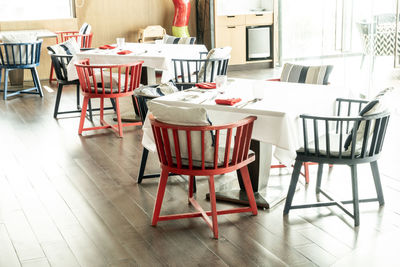 Empty chairs and table in restaurant