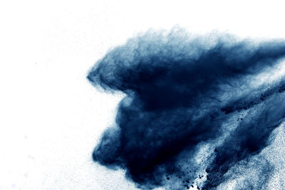 Close-up of smoke against white background