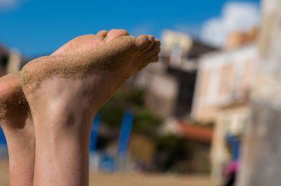 Close-up of hand against blurred background