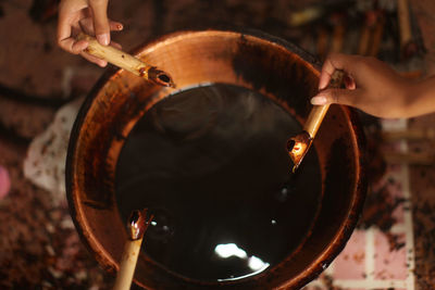 Midsection of person preparing food