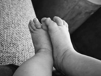 Low section of baby feet