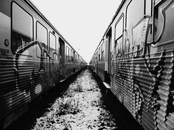 Train on railroad track against sky
