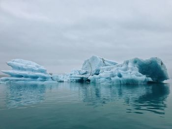 Scenic view of  frozen lake against sky