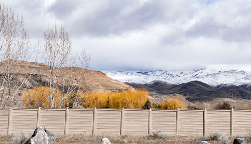 Scenic view of snowcapped mountains against sky