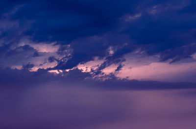 Low angle view of dramatic sky during sunset