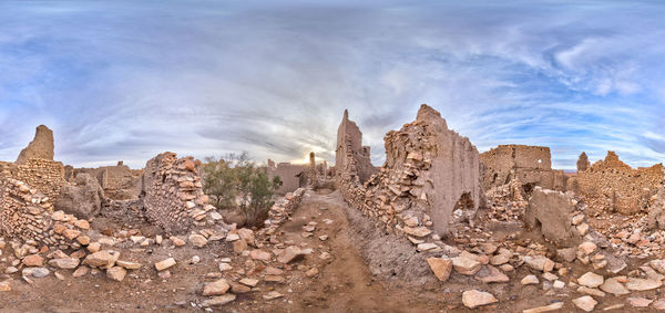 Panoramic view of rock formations against sky