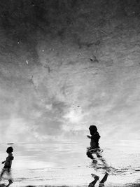 Blur and abstract background of groundwater reflection of children playing