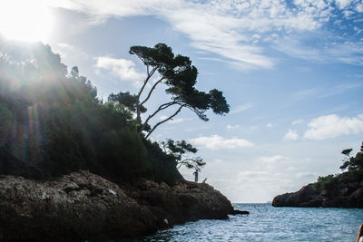 Scenic view of sea against cloudy sky