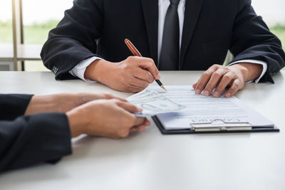 Business colleagues working at desk in office