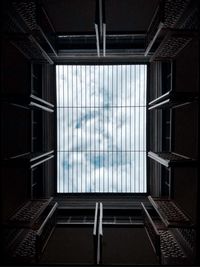 Directly below shot of building against sky