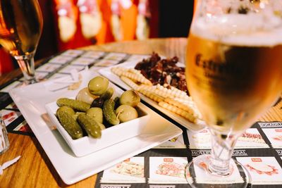 Beer glass on table at restaurant