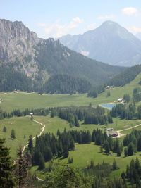 Scenic view of landscape and mountains against sky