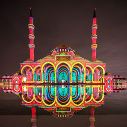 Low angle view of temple against sky at night