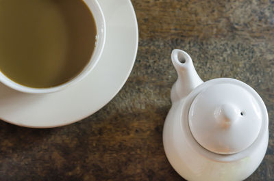 High angle view of coffee cup on table