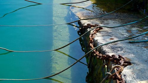 Close-up of rope tied on metal