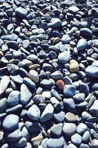 Full frame shot of pebbles on beach