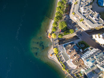 High angle view of canal amidst buildings