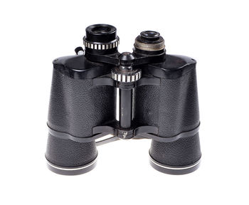 Close-up of camera against white background