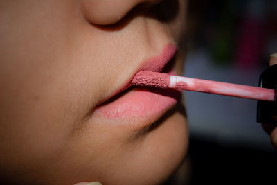 Close-up of woman with pink hair