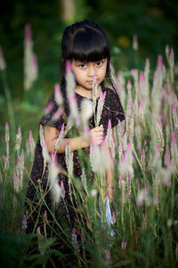 Beautiful woman standing on field