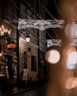Illuminated buildings in city at night