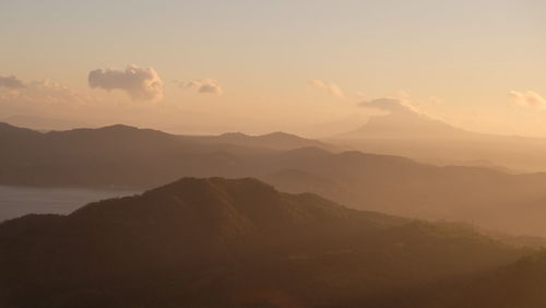Scenic view of mountains against sky during sunset