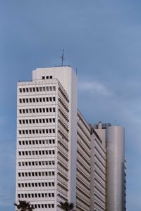 Low angle view of modern buildings against sky