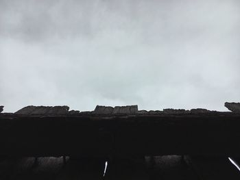 Low angle view of old building against sky