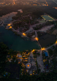 High angle view of illuminated buildings in city