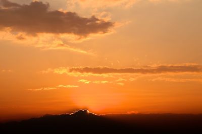 Scenic view of mountains at sunset