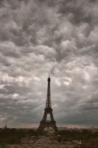 Building exterior against cloudy sky