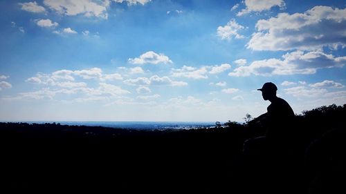 Silhouette of man against sky