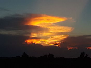 Low angle view of dramatic sky during sunset