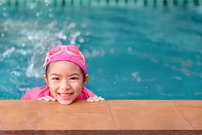 Portrait of girl in swimming pool