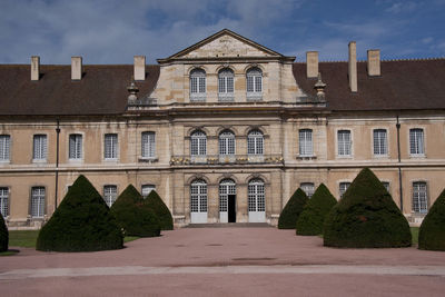 Facade of historic building against sky