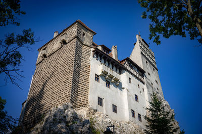 Low angle view of old building against sky